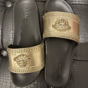 Versace women’s slides still have them for sale